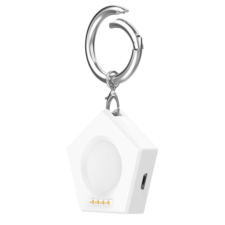 White keychain smartwatch charger with round charging pad and gold contacts