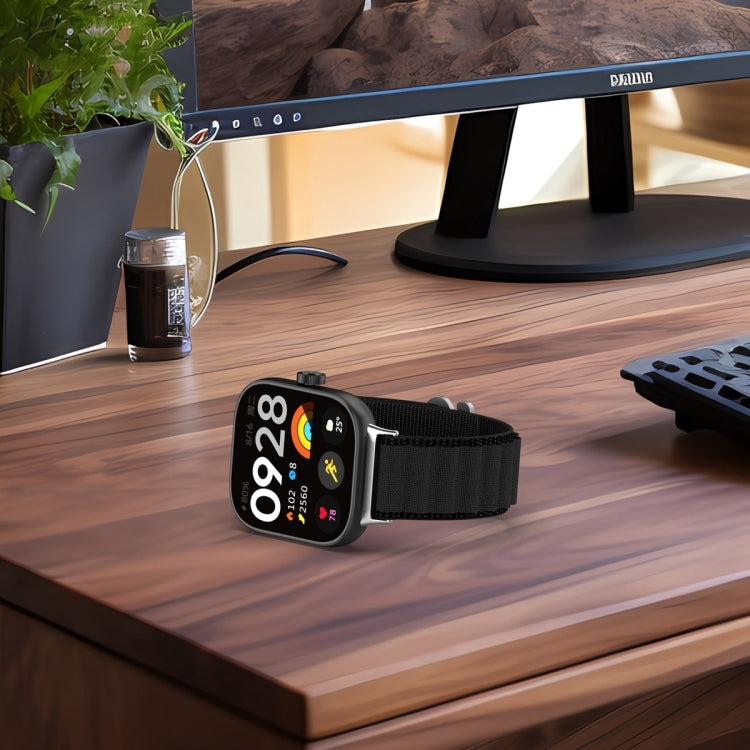 Black nylon loop watch band attached to a smartwatch, shown from the front