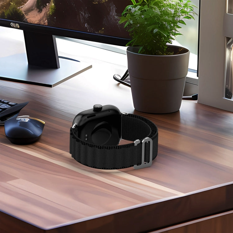 Black nylon loop watch band attached to a smartwatch, shown from the back