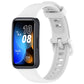 White silicone watch band with buckle, shown on a Huawei fitness tracker