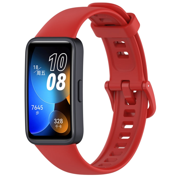 Red silicone watch band with buckle, shown on a Huawei fitness tracker