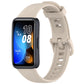 Ivory silicone watch band fitted to a black Huawei Band fitness tracker