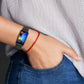 Black silicone watch band worn on a wrist
