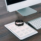 Black silicone watch band wrapped around a fitness tracker