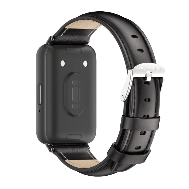 Back view of black leather watch band with beige lining and silver buckle