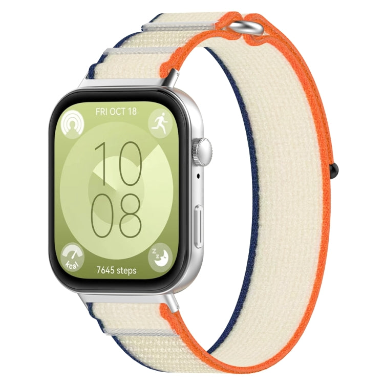 Cream nylon loop watch band with orange and navy edging on a smartwatch