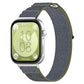 Loop nylon watch band in gray and navy with olive edging, shown on a silver watch