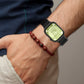 Black nylon loop watch band worn on a wrist