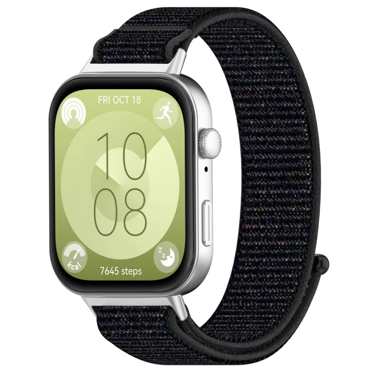 Black nylon hook-and-loop watch band attached to a smartwatch
