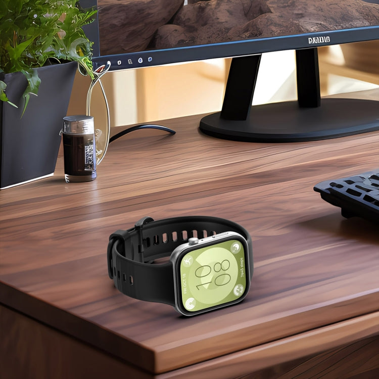 Black silicone sports watch band attached to a smartwatch, shown from the display side