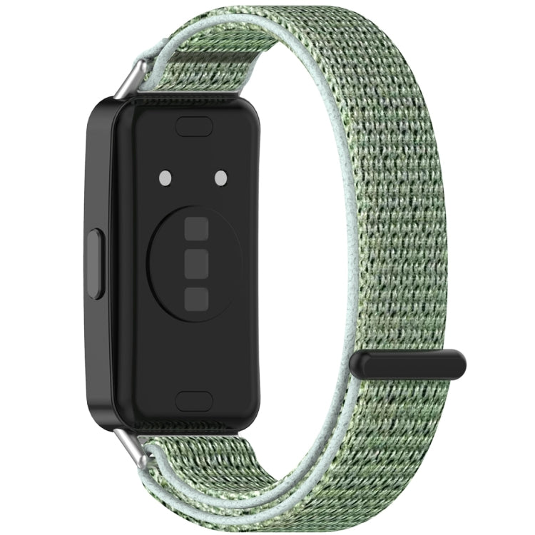 Back view of green nylon hook-and-loop watch band on a fitness tracker