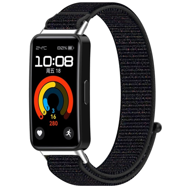 Black nylon hook-and-loop watch band shown attached to a fitness tracker