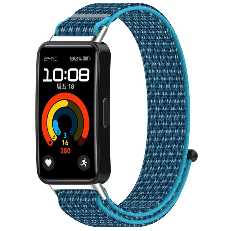 Blue nylon hook-and-loop watch band shown attached to a fitness tracker
