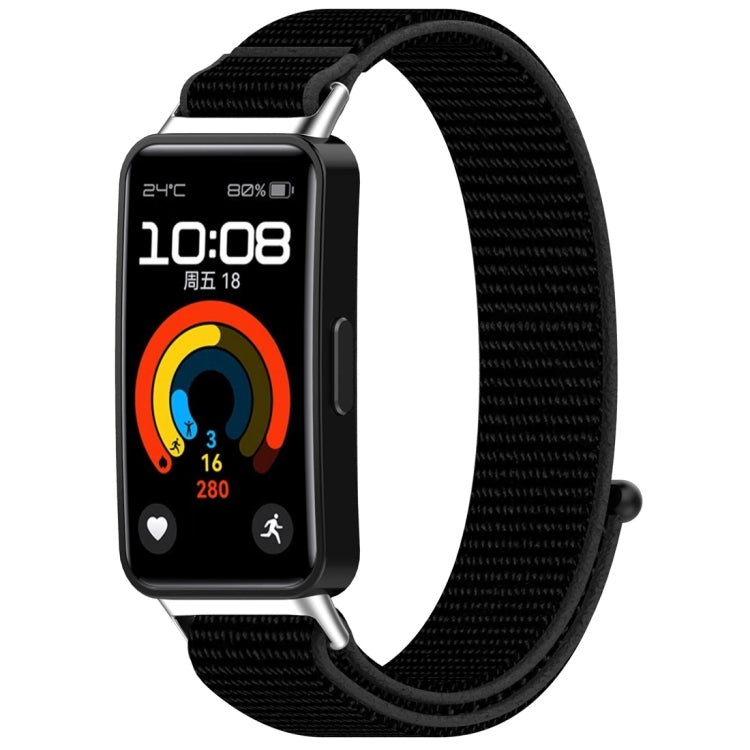 Black nylon hook-and-loop watch band shown attached to a fitness tracker