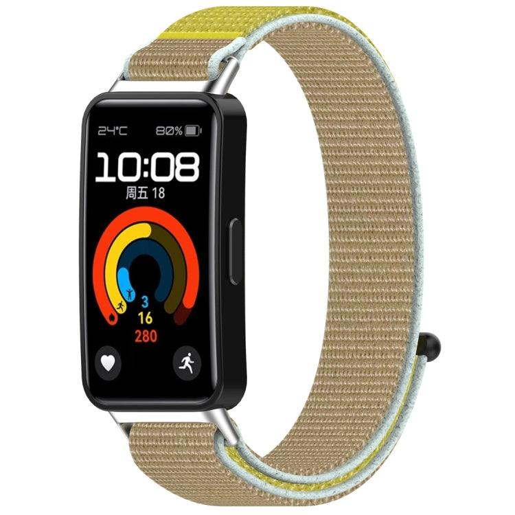 Tan nylon hook-and-loop watch band shown attached to a fitness tracker