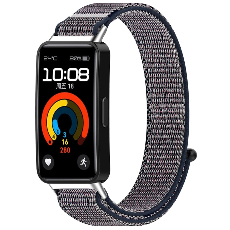 Multicolor nylon hook-and-loop watch band shown attached to a fitness tracker