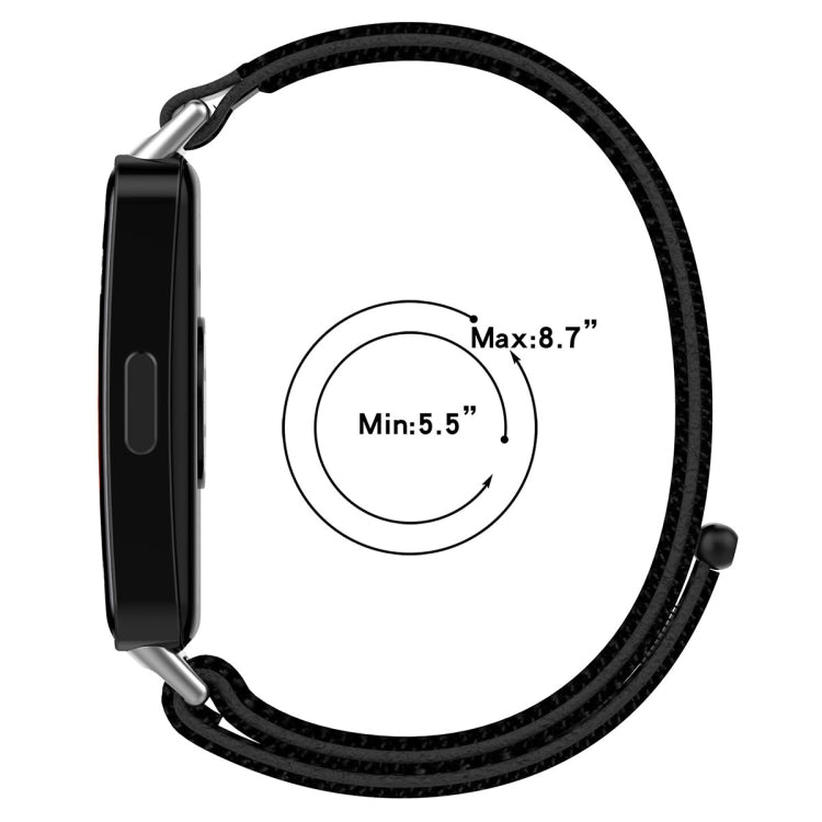 Black nylon watch band shown around a tracker, sized for 5.5 to 8.7 inch wrists