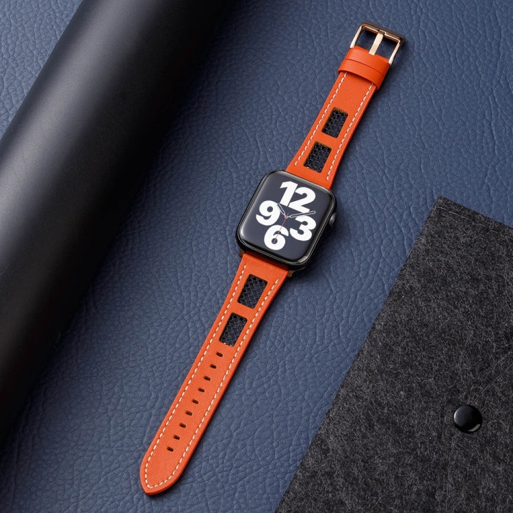 Orange perforated leather Apple Watch band with white stitching, shown on a watch