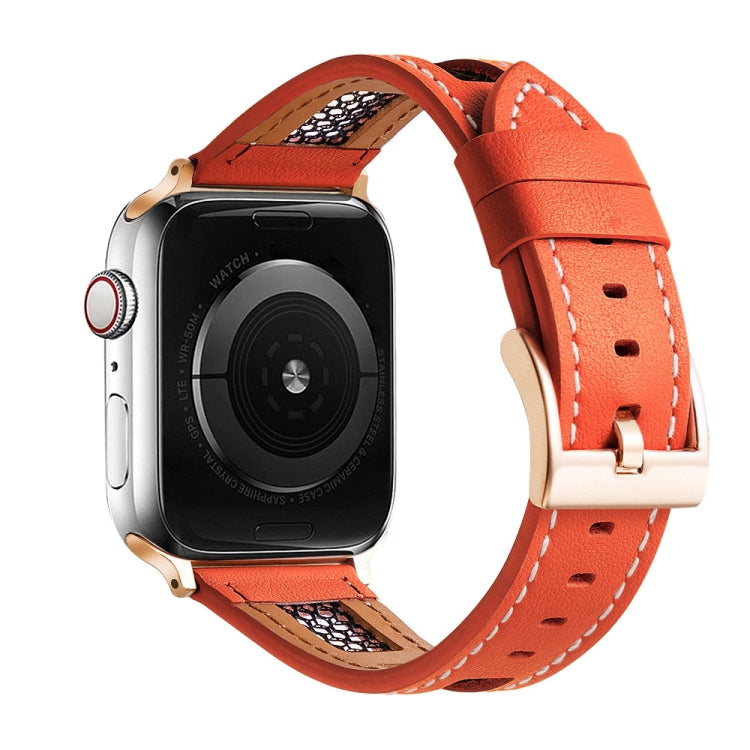 Orange leather Apple Watch band with perforations and gold-tone buckle