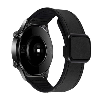 Black textured watch band with a magnetic buckle, shown on a smartwatch