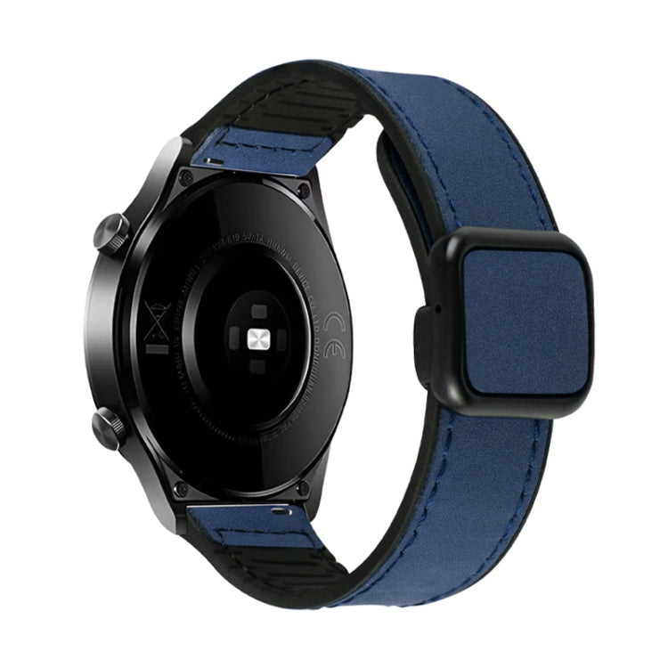 Dark blue textured watch band with black magnetic buckle, shown on a watch