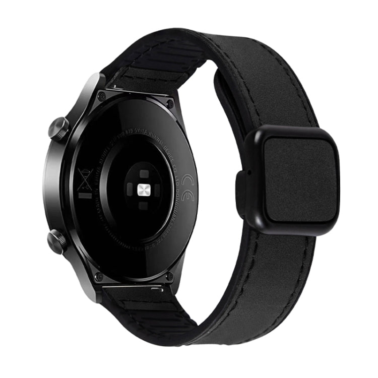 Black watch band with a fold-over magnetic buckle and stitched edges