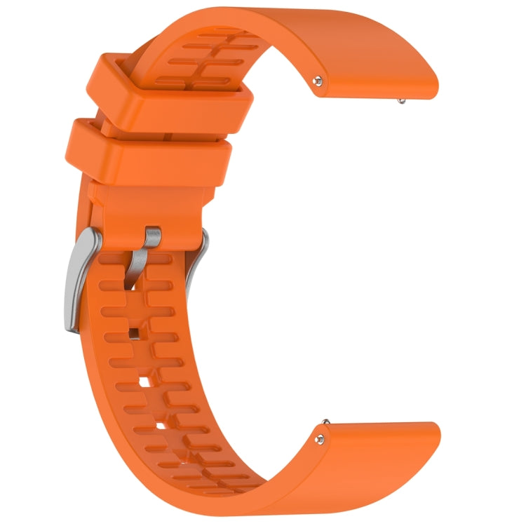 Reverse view of orange fluororubber watch band showing buckle and textured underside.