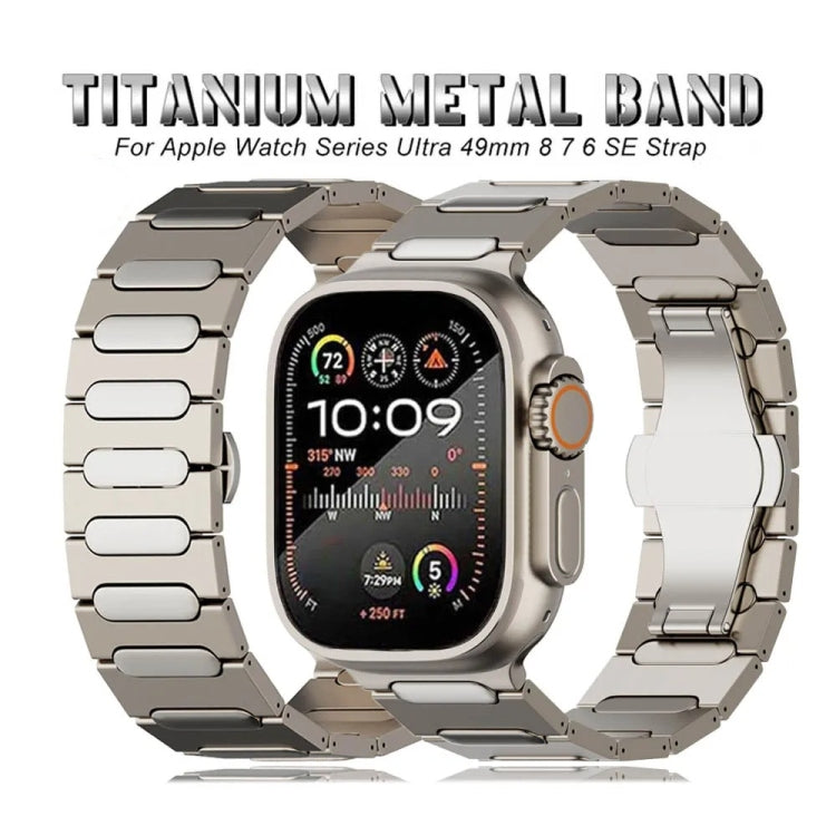 Titanium alloy watch band with oval links and butterfly clasp on a watch