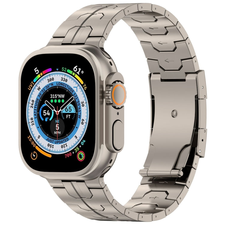 Titanium-tone linked metal Apple Watch band with turtle buckle and compass-face watch