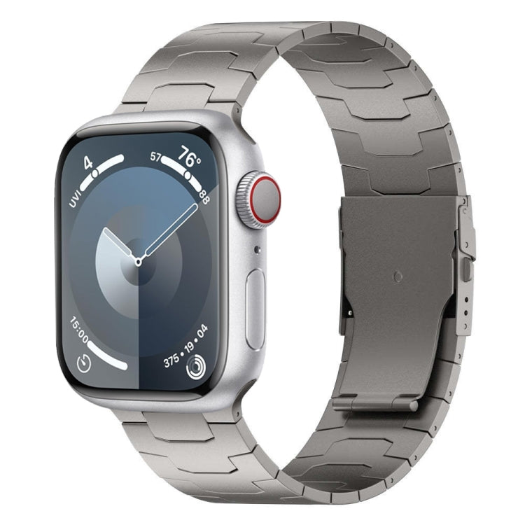 Silver titanium alloy band with wide links, shown attached to a smartwatch