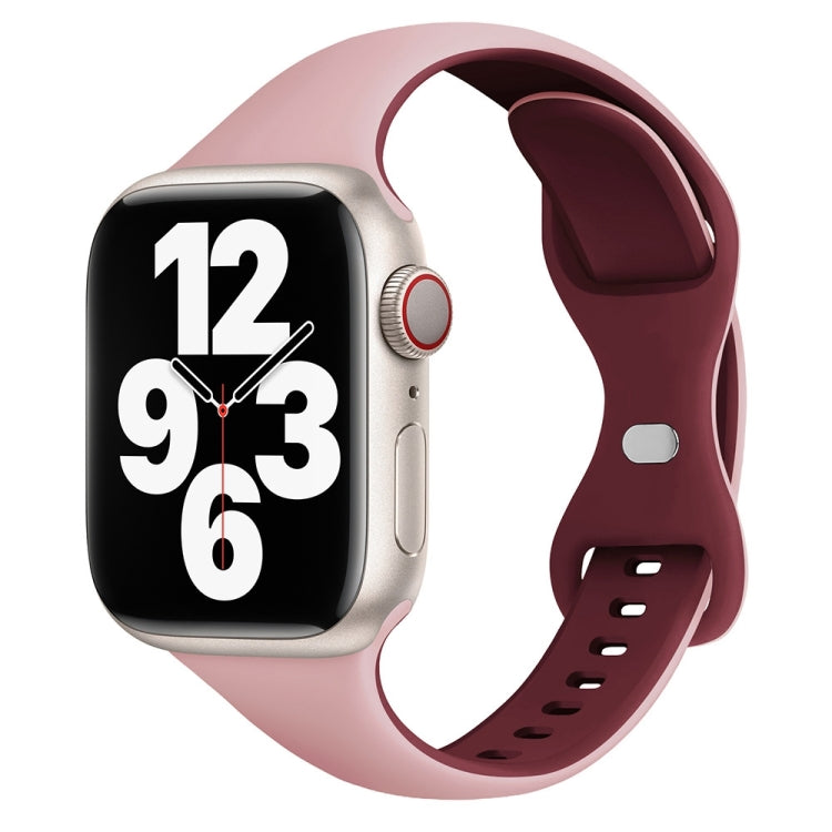 Pink and wine red silicone watch band with butterfly buckle and adjustable holes, shown on a smartwatch.