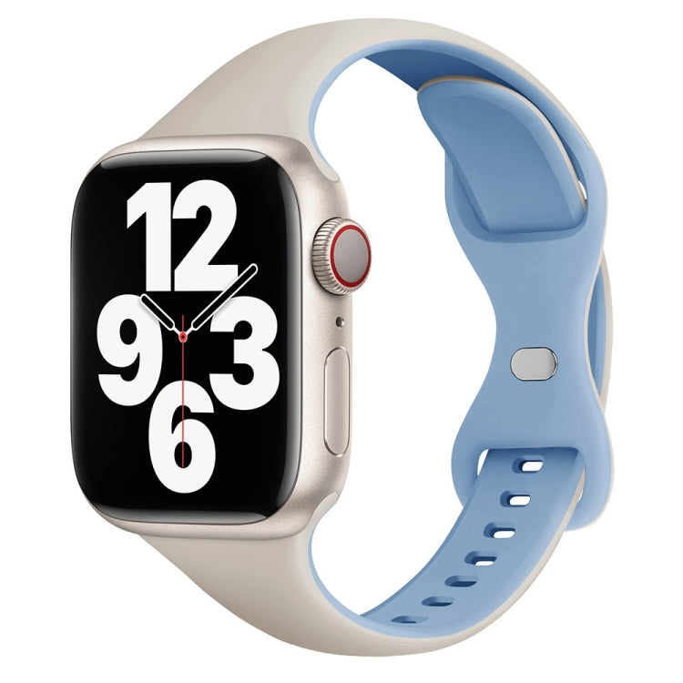 White and fog blue silicone watch band with butterfly buckle and adjustable holes, shown on a smartwatch.