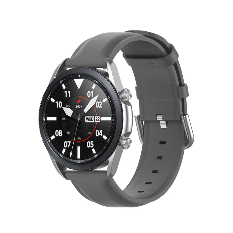 Gray leather watch strap with metal buckle and adjustment holes