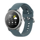 Teal silicone watch strap with metal buckle and silver watch case