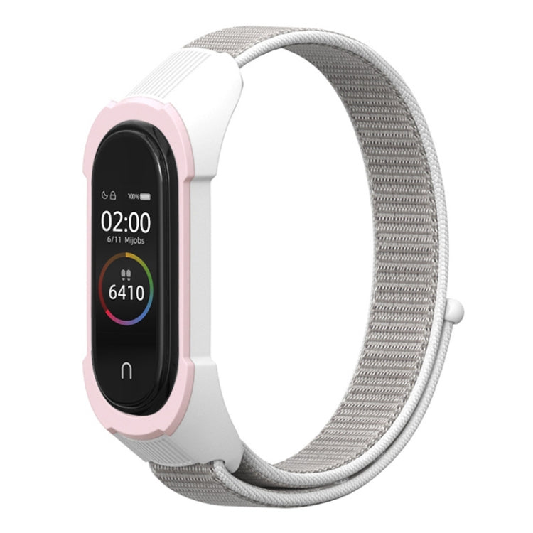 Pink and white nylon watch strap with gray woven band and smartwatch display