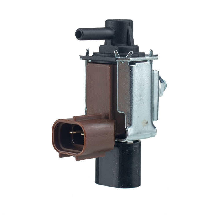 Auto vacuum solenoid valve with brown electrical plug and black mounting bracket