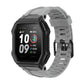 Light gray silicone watch strap with perforated links and secure buckle