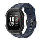 Navy blue silicone watch strap with rugged buckle and vented perforations