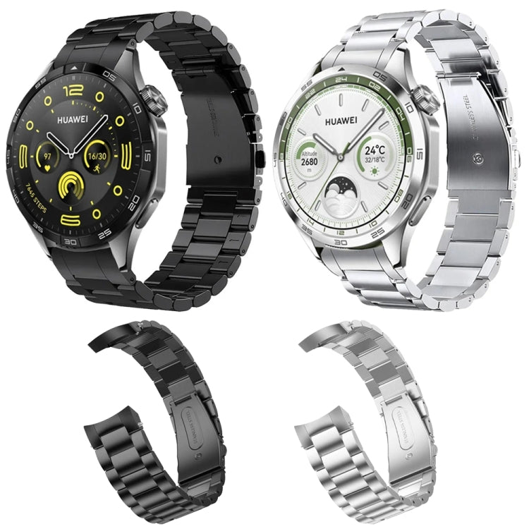 Black and silver stainless steel watch bands shown with curved links and folding clasps.
