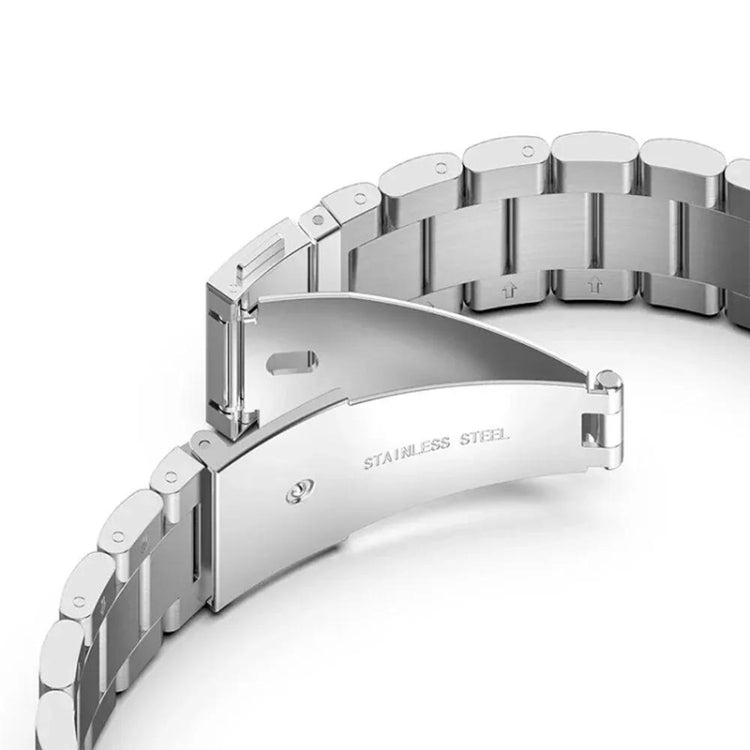 Silver stainless steel watch band with an open folding clasp and curved links.