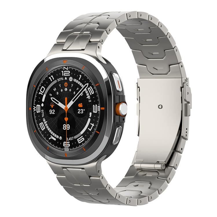 Gray titanium link watch band with a safety clasp and smartwatch.