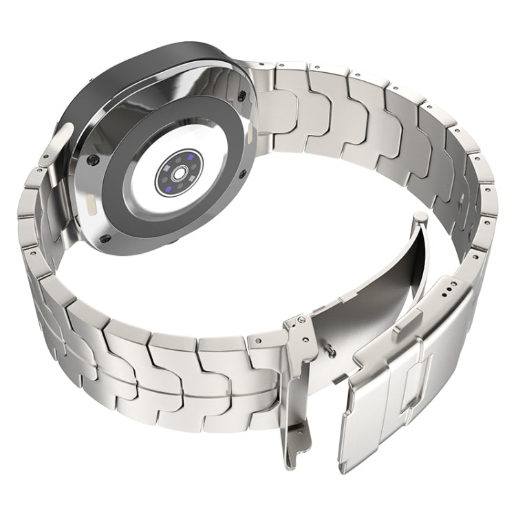 Silver titanium link watch band with a folding safety clasp, shown attached to a watch.