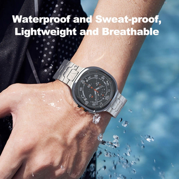 Silver titanium link watch band worn with a watch on the wrist.