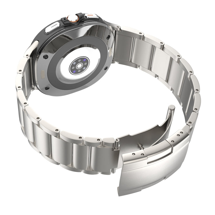Silver titanium steel watch band with three-bead links and folding clasp, shown from the back