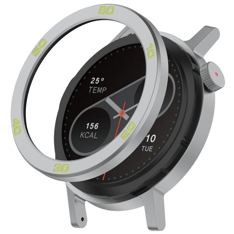 Metal watch bezel ring with raised numerals around a round smartwatch face