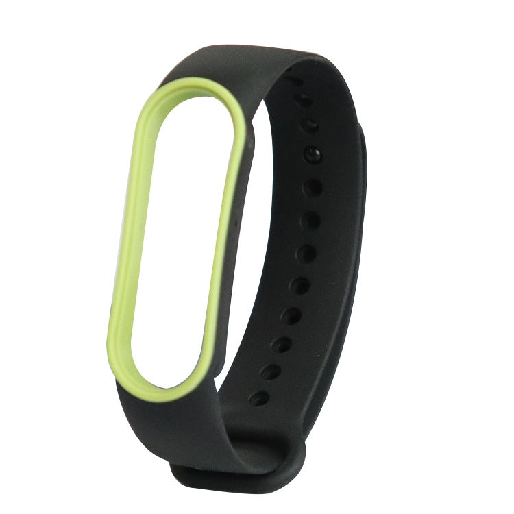 Two-tone TPE smartwatch strap for Mi Band 5, black with lime yellow inner loop.