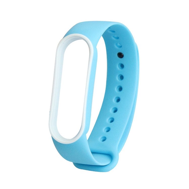 Two-tone TPE smartwatch strap for Mi Band 5, light blue with white inner loop.