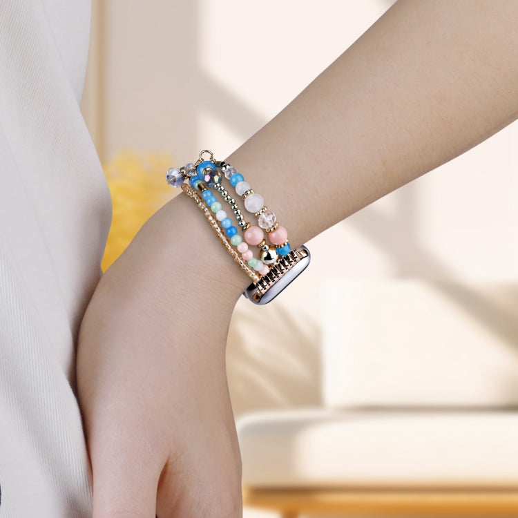 Multicolor beaded Apple Watch band worn on a wrist