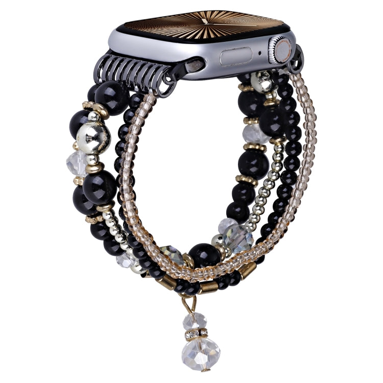 Black beaded Apple Watch band with chain strands and a dangling crystal charm