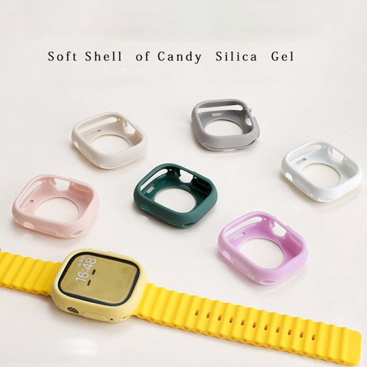 Silicone half-coverage Apple Watch cases in assorted colors, shown with a yellow watch band